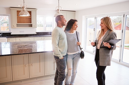 https://media.istockphoto.com/photos/female-realtor-showing-couple-interested-in-buying-around-house-picture-id1166187828?b=1&k=6&m=1166187828&s=170667a&w=0&h=0yx1Id0cHZMispSl6l0J421oG5GZAxN5hOQp-zM4nJM=