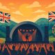 Colorful crowd enjoying live performances at a major UK music festival with flags and stage lights