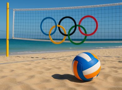 Olympic beach volleyball court with net and stadium seating under a clear blue sky